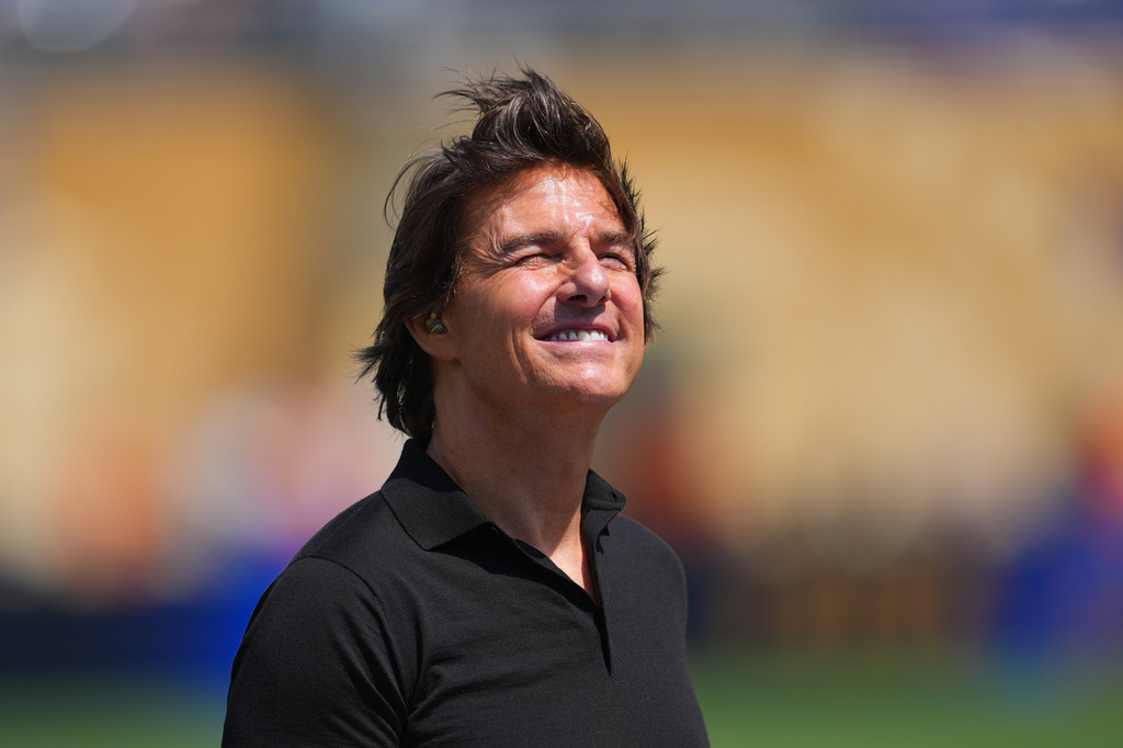 Tom Cruise speaks during the World Cup final soccer match between Spain and Argentina in East Rutherford, N.J., near New York, Sunday, July 19, 2026. (AP Photo/Julio Cortez)