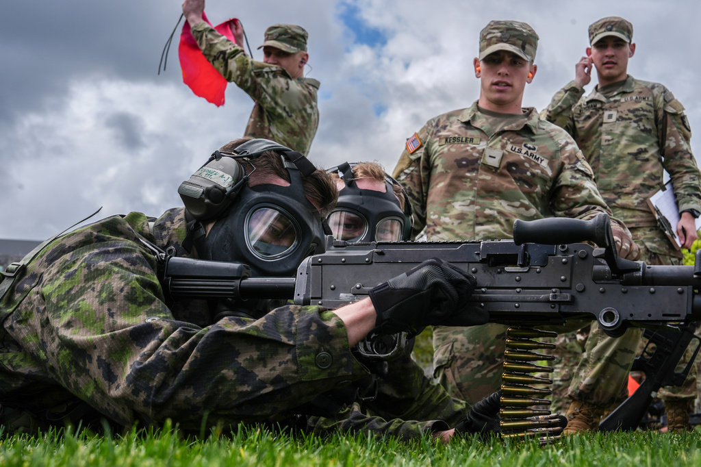 Finnish cadets shoot blanks during the crucible portion of the Sandhurst Military Skills Competition at the United States Military Academy in West Point, N.Y., Saturday, May 2, 2026. (AP Photo/Julia Demaree Nikhinson)