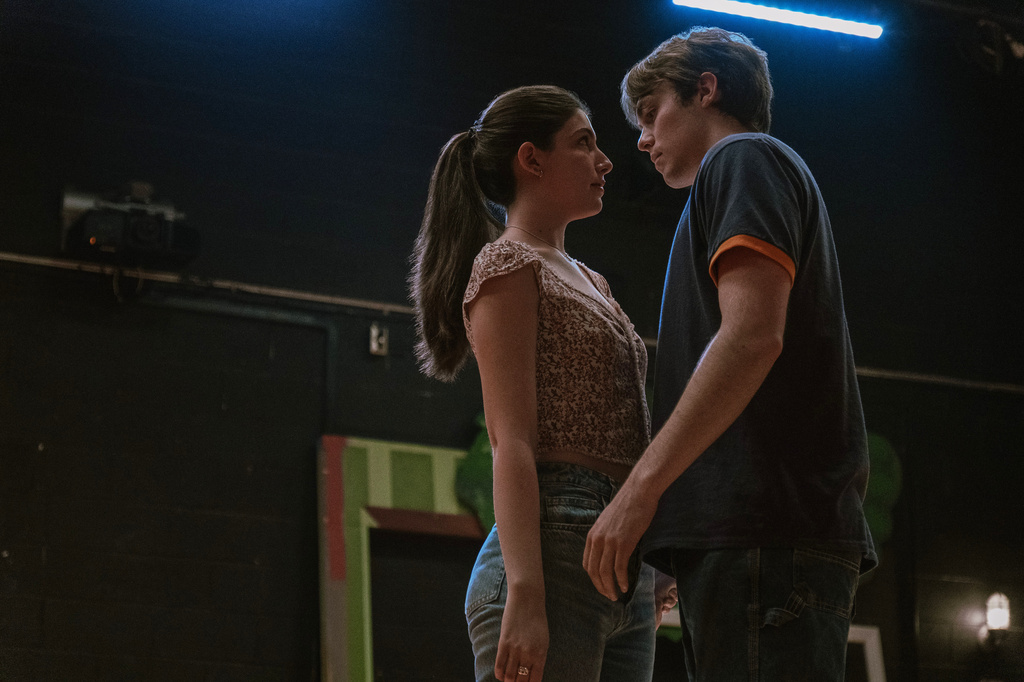 This image released by Netflix shows Sunny Sandler, left, and Jack Champion in a scene from "Don't Say Good Luck." (Jaclyn Martinez/Netflix via AP)