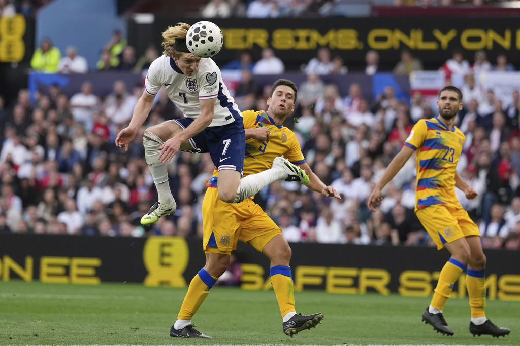 England's Anthony Gordon heads the ball during the World Cup Group K qualifying match between England and Andorra at Villa Park stadium in Birmingham, Saturday, Sept. 6, 2025 . (AP Photo/Dave Shopland)