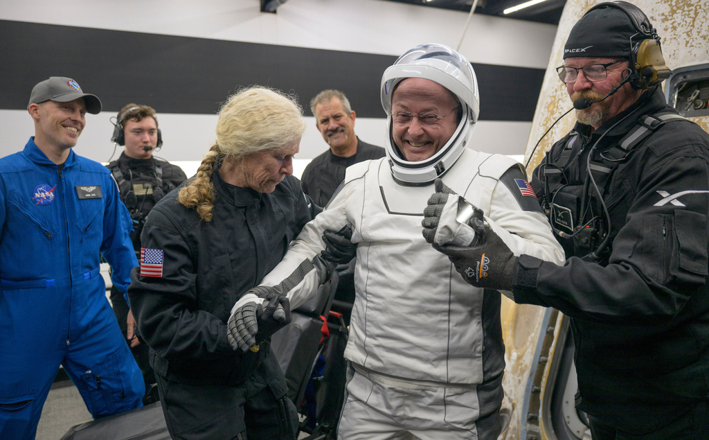 FILE - In his image provided by NASA, NASA astronaut Mike Fincke is helped out of the SpaceX Crew-11 capsule after they re-entered the Earth in a middle-of-the-night splashdown near San Diego, Calif., on Jan. 15, 2026. (Bill Ingalls/NASA via AP, File)