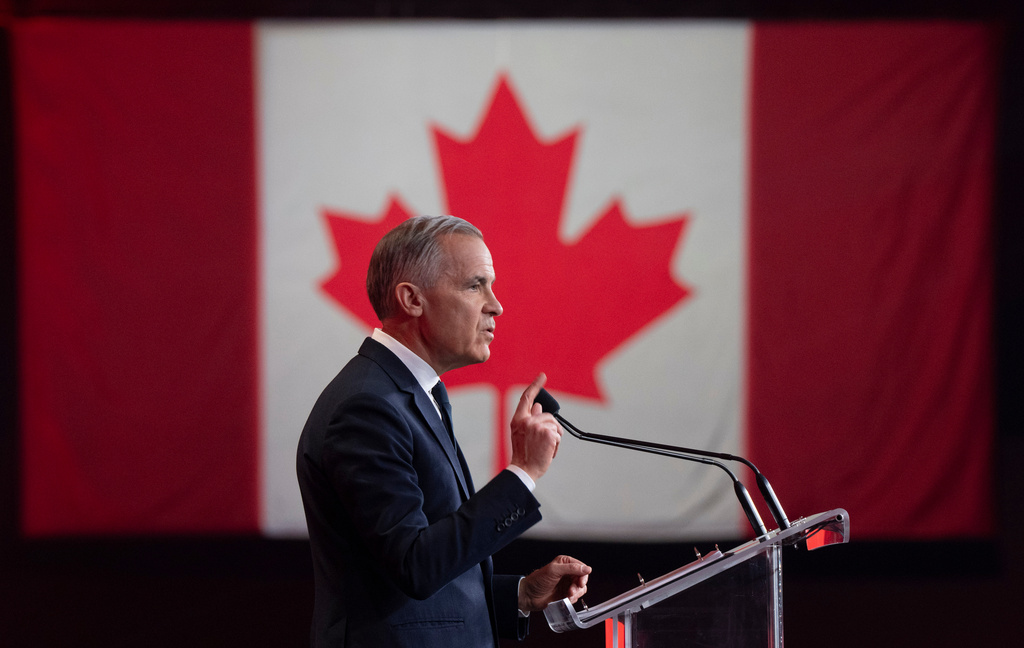 Canada's Prime Minister Mark Carney speaks at the Liberal national convention in Montreal, Saturday, April 11, 2026. (Christinne Muschi/The Canadian Press via AP)