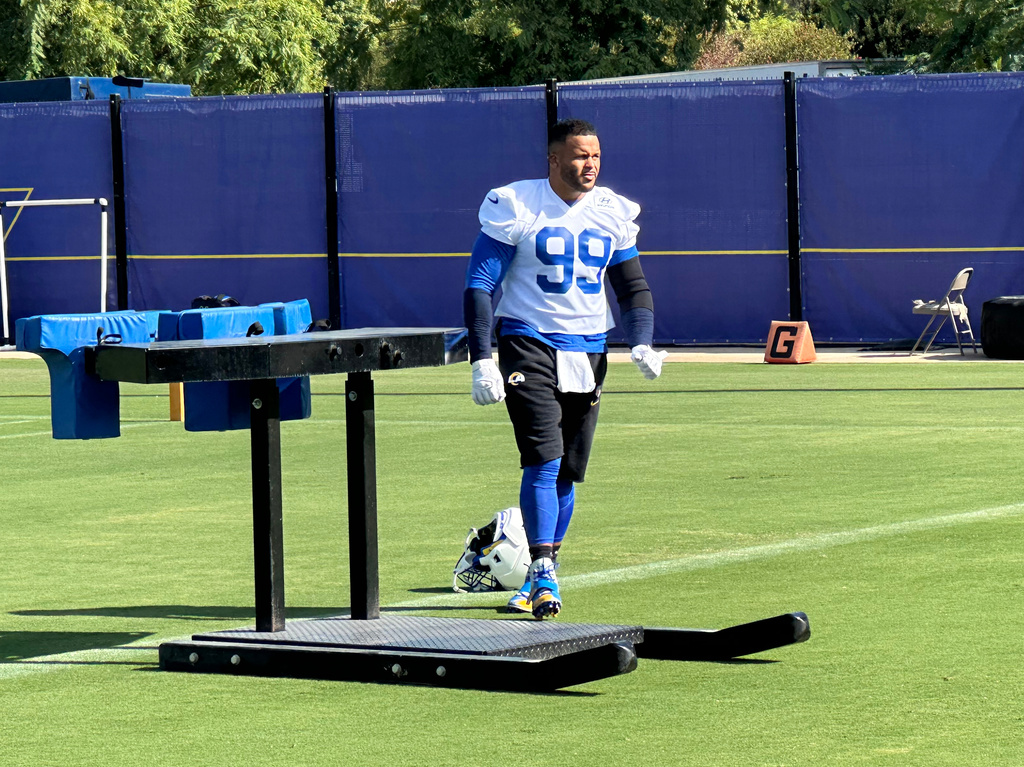 Aaron Donald takes the field for practice at the Los Angeles Rams' training complex in Los Angeles, Sunday, Aug. 30, 2026. (AP Photo/Greg Beacham)