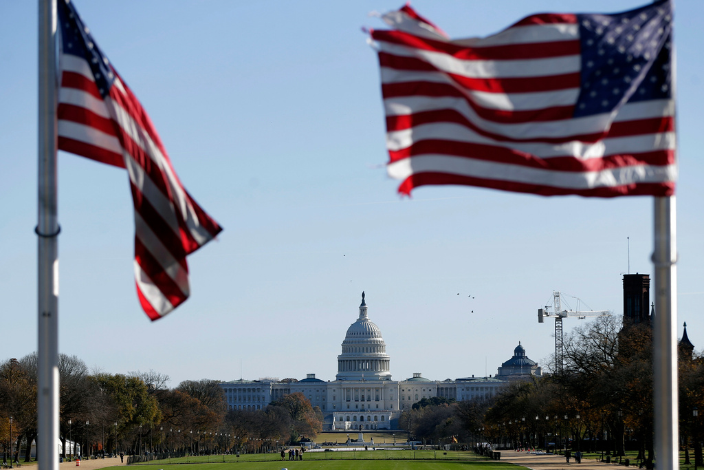 The U.S. Capitol is pictured from the base of the Washington Monument, Thursday, Nov. 13, 2025, in Washington. (AP Photo/Rahmat Gul)