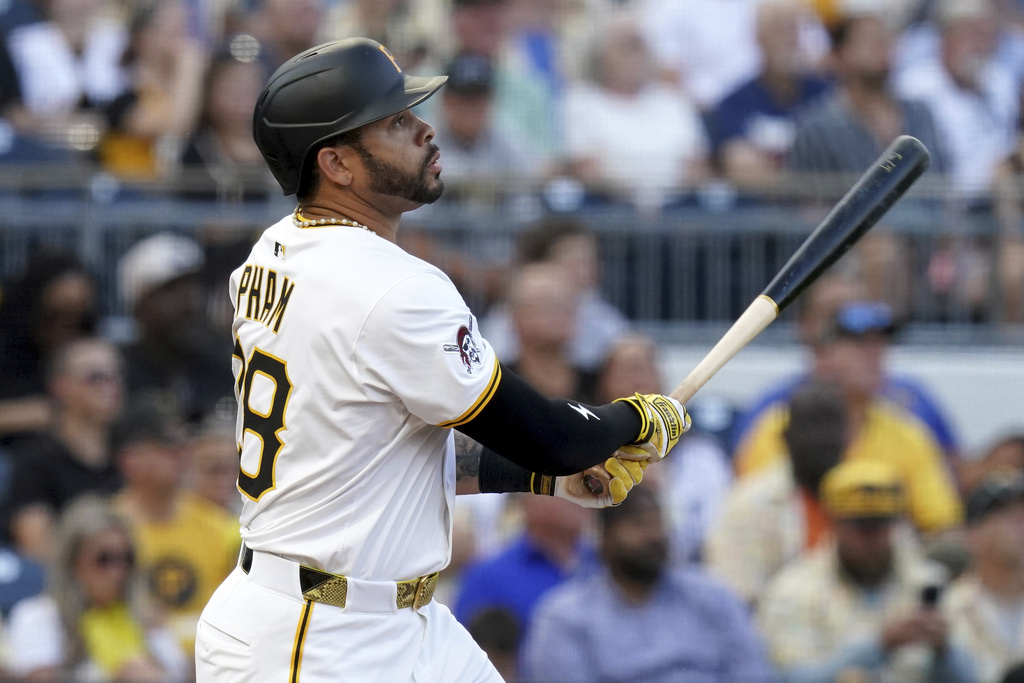 Pittsburgh Pirates' Tommy Pham watches his sacrifice fly during the third inning of a baseball game against the Cincinnati Reds, Saturday, Aug. 9, 2025, in Pittsburgh. (AP Photo/Matt Freed)