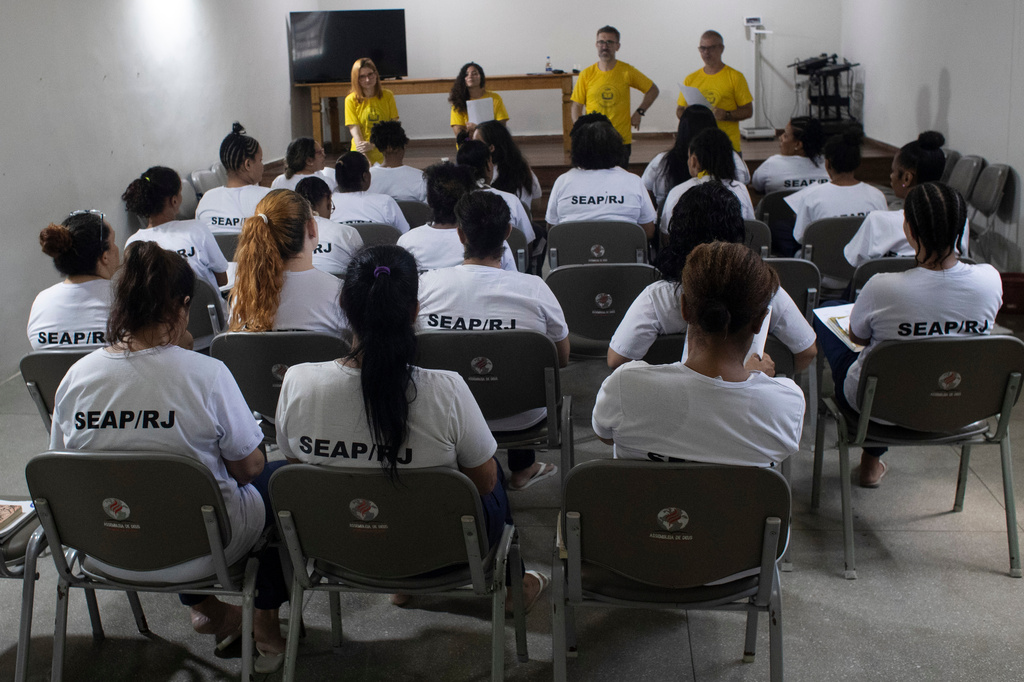 Incarcerated women participate in a reading program part of the Federal University of Rio de Janeiro's "Literature, Existence and Resistance" project, at the Djanira Dolores de Oliveira women's prison in Rio de Janeiro, Wednesday, March 25, 2026. (AP Photo/Bruna Prado)