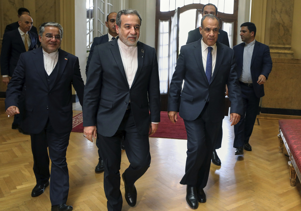 Egyptian Foreign Minister Badr Abdelatty, front right, accompanies his Iranian counterpart Abbas Araghchi, front, upon his arrival at Tahrir Palace in Cairo, Egypt, Tuesday, Sept. 9, 2025. (AP Photo/Khaled Elfiqi)