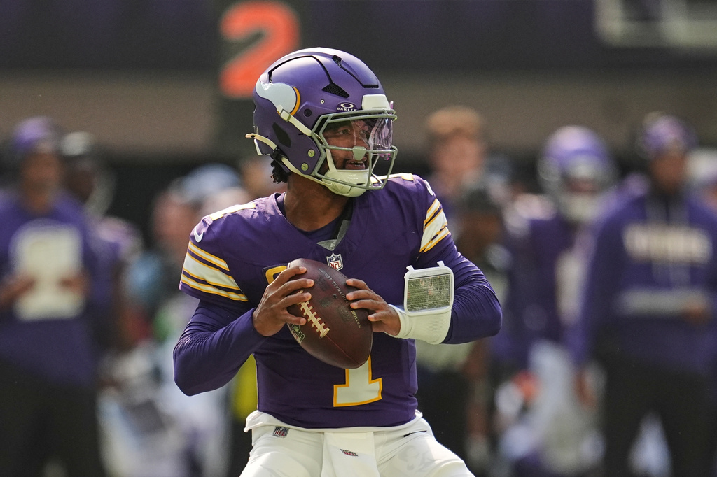 Minnesota Vikings quarterback Kyler Murray drops back to pass during the first half of an NFL football game against the Green Bay Packers Sunday, Sept. 13, 2026, in Minneapolis, Minn. (AP Photo/Abbie Parr)
