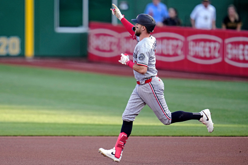 Minnesota Twins' Kody Clemens rounds the bases after hitting a solo home run off Pittsburgh Pirates pitcher Jared Jones during the first inning of a baseball game in Pittsburgh, Friday, May 29, 2026. (AP Photo/Gene J. Puskar)