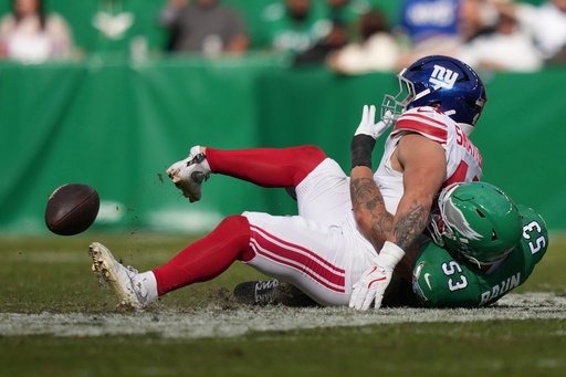 New York Giants running back Cam Skattebo (44) is injured near Philadelphia Eagles linebacker Zack Baun (53) during the first half of an NFL football game Sunday, Oct. 26, 2025, in Philadelphia. (AP Photo/Matt Slocum) New York Giants running back Cam Skattebo (44) is injured near Philadelphia Eagles linebacker Zack Baun (53) during the first half of an NFL football game Sunday, Oct. 26, 2025, in Philadelphia. (AP Photo/Matt Slocum)