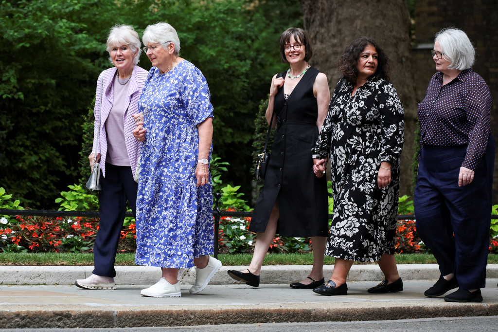 Campaigners arrive for a meeting with Britain's Prime Minister Keir Starmer at Downing Street, to discuss historical forced adoption, in London, Thursday July 2, 2026. (Isabel Infantes/Pool Photo via AP)