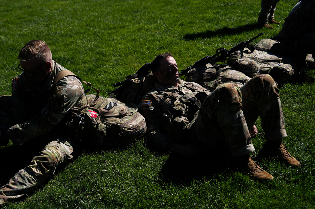 Cadets rest before competing in the grenade assault course during the Sandhurst Military Skills Competition at the United States Military Academy in West Point, N.Y., Friday, May 1, 2026. (AP Photo/Julia Demaree Nikhinson)