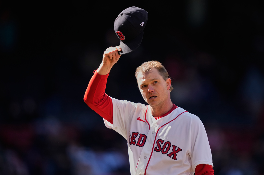 Boston Red Sox starting pitcher Sonny Gray tips his cap while being taken out of the game during the seventh inning of a baseball game against the Milwaukee Brewers at Fenway Park, Wednesday, April 8, 2026, in Boston. (AP Photo/Charles Krupa)
