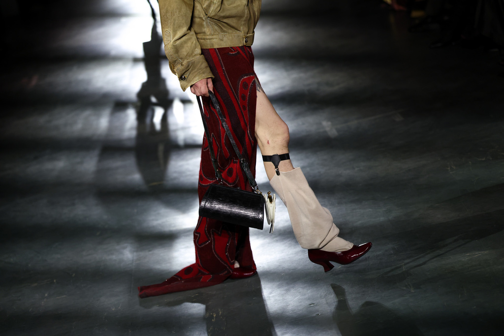 A model wears a creation from the Vivienne Westwood Fall/Winter 2026-2027 Women's collection presented in Paris, Saturday, March 7, 2026. (AP Photo/Tom Nicholson)