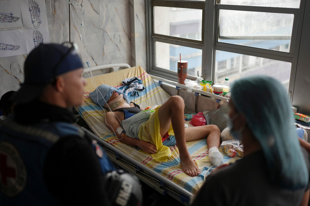 Fabricio Gutierrez, 16, recovers at Perez Carreno Hospital in Caracas, Venezuela, after his foot was amputated because of injuries he suffered when the apartment building where he lived in La Guaira collapsed during the earthquake, Saturday, July 4, 2026. (AP Photo/Matias Delacroix)