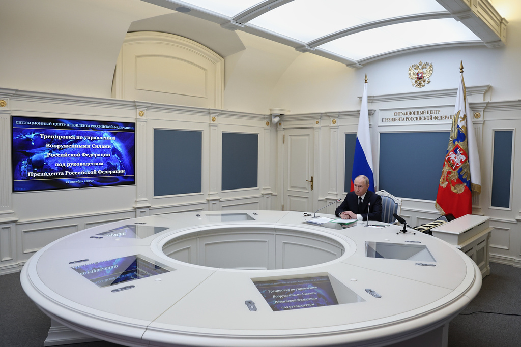 Russia President Vladimir Putin conducts a strategic nuclear forces exercise via videoconference from the Presidential Situation Centre at the Kremlin in Moscow, on Wednesday, Oct. 22, 2025. (Alexander Kazakov, Sputnik, Kremlin Pool Photo via AP)