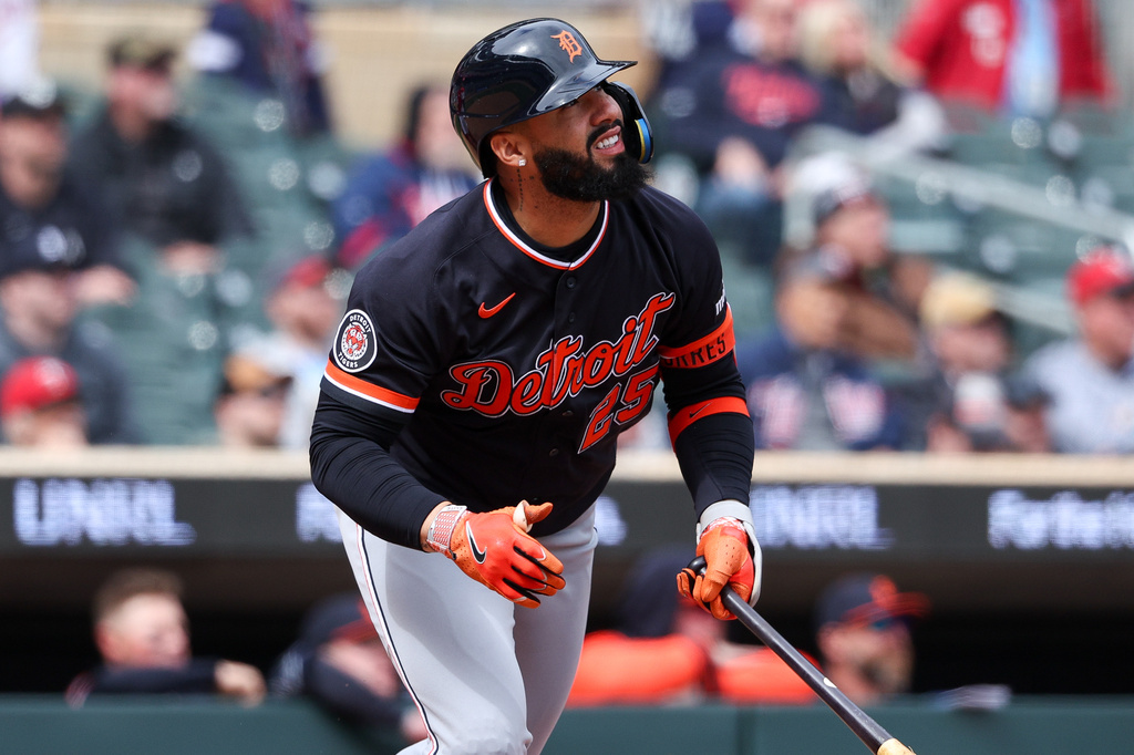 Detroit Tigers designated hitter Gleyber Torres hits an RBI sacrifice fly against the Minnesota Twins during the seventh inning of baseball game, Thursday, April 9, 2026, in Minneapolis. (AP Photo/Matt Krohn)