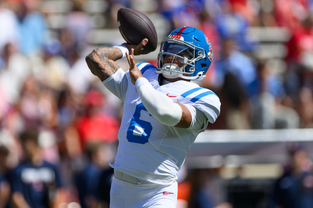 Ole Miss QB Trinidad Chambliss injures his left thigh at No. 21 Florida but returns to game