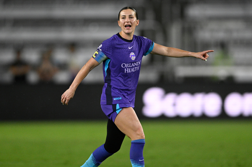 FILE - Orlando Pride defender Haley McCutcheon (2) directs a play during an NWSL soccer match against Seattle Reign FC, on March 15, 2026 in Orlando, Fla. (AP Photo/Phelan M. Ebenhack, File)