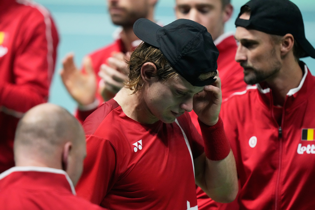 Belgium's Zizou Bergs reacts after losing against Italy's Flavio Cobolli in a Davis Cup singles semifinal match between Italy and Belgium, in Bologna, Italy, Friday, Nov. 21, 2025. (AP Photo/Luca Bruno)