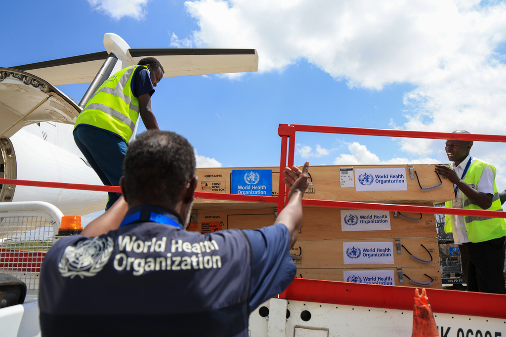 Workers load World Health Organization (WHO) emergency supplies onto a United Nations plane in Nairobi, Kenya, Wednesday, May 20, 2026, headed for Congo to combat the Ebola outbreak in Ituri province. (AP Photo/Andrew Kasuku)
