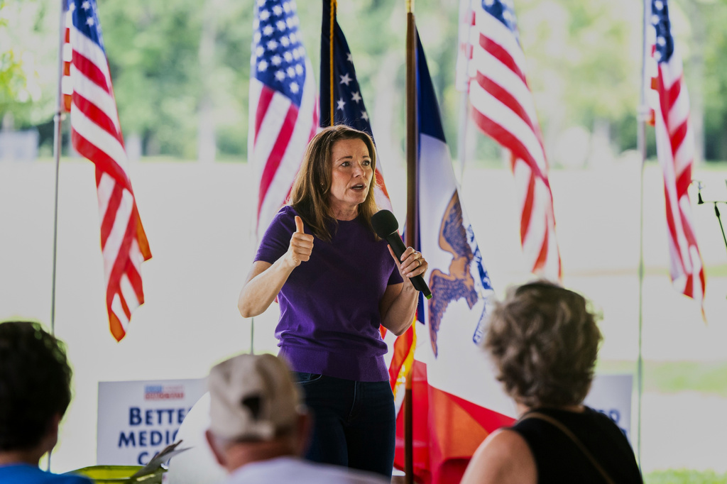 Christina Bohannan, Democratic candidate for U.S. House, speaks during the Scott County Democrats Annual Family Picnic, in Bettendorf, Iowa, Sunday, Aug. 16, 2026. (AP Photo/Joseph Cress)