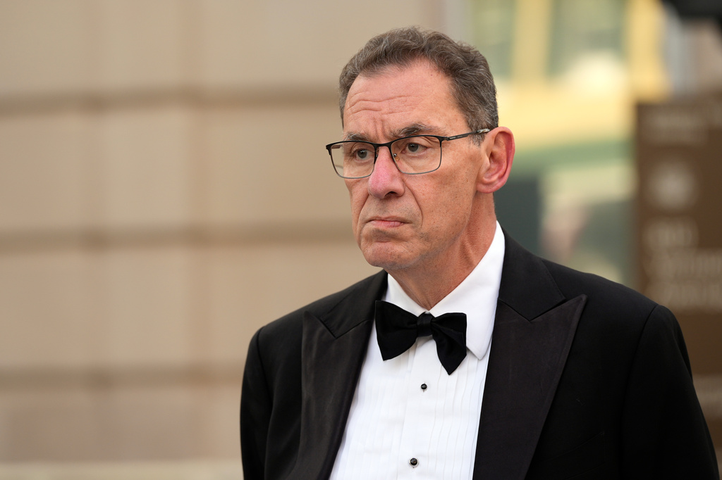 Pfizer chairman and CEO Albert Bourla walks to the White House to attend a state dinner hosted for China's President Xi Jinping, Thursday, Sept. 24, 2026, in Washington. (AP Photo/Carolyn Kaster)