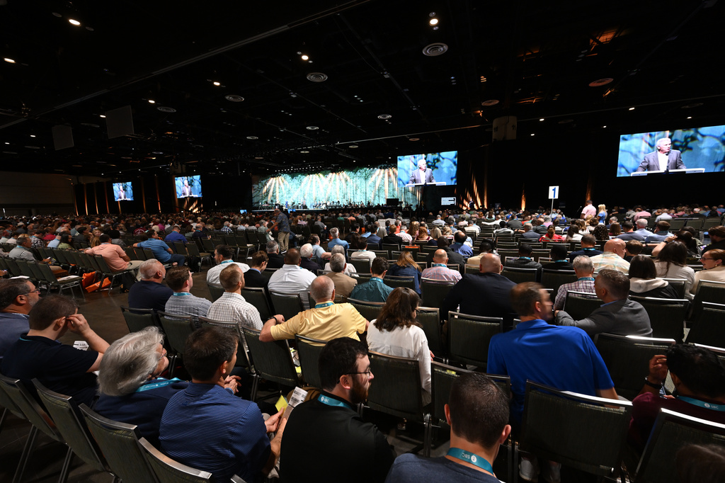 FILE - Attendees listen to a presentation during the annual meeting of the Southern Baptist Convention, Tuesday, June 9, 2026, in Orlando, Fla. (AP Photo/Phelan M. Ebenhack, File)