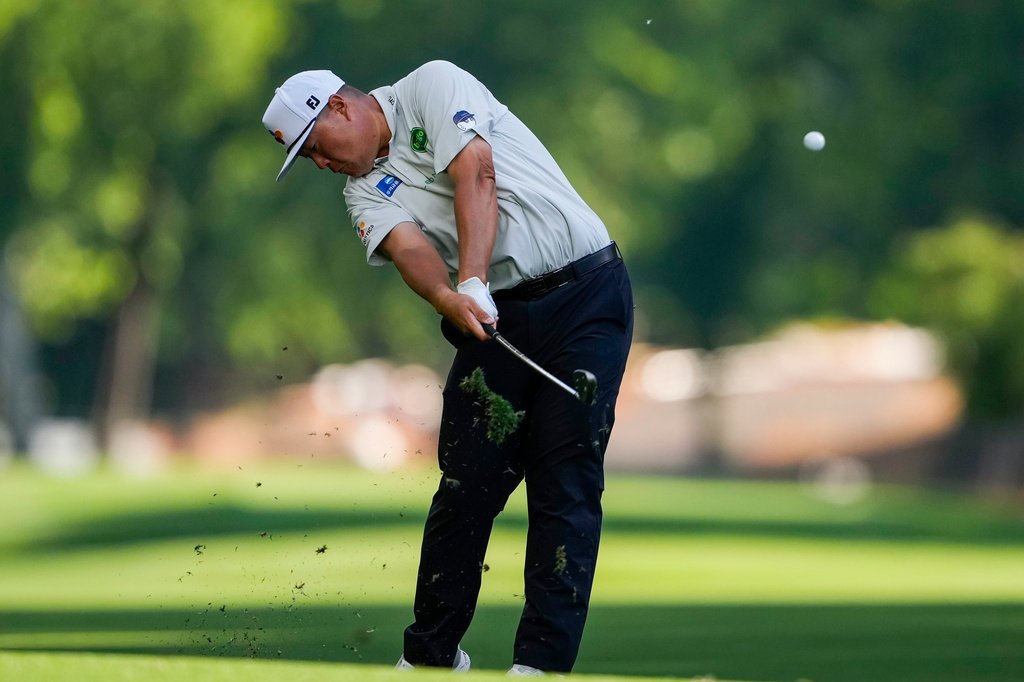 Sungjae Im, of South Korea, hits from the second fairway during first round of the Truist Championship golf tournament at the Quail Hollow Club, Thursday, May 7, 2026, in Charlotte, N.C. (AP Photo/Chris Carlson)