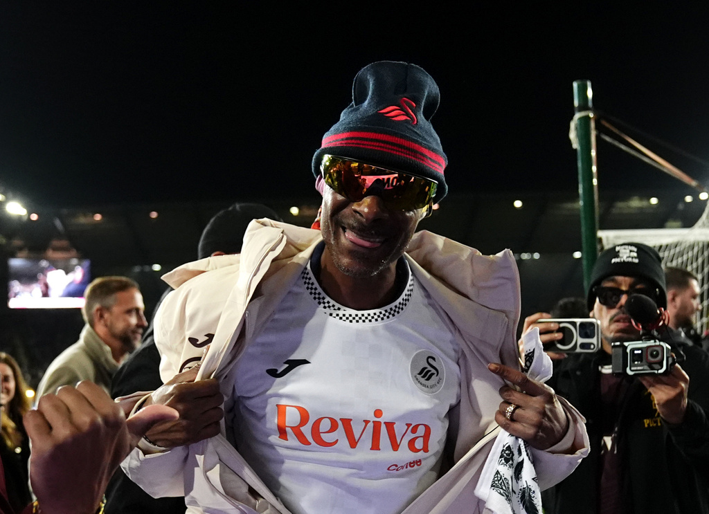Swansea City co-owner Snoop Dogg ahead of the English Championship soccer match between Swansea City and Preston in Swansea, Wales, Tuesday, Feb. 24, 2026. (Jacob King/PA via AP)