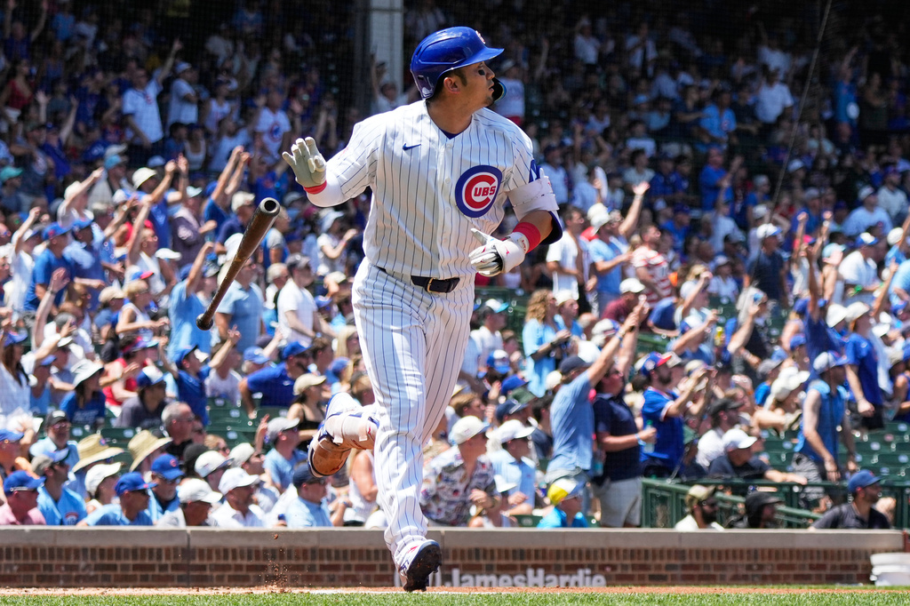 Chicago Cubs' Seiya Suzuki of Japan, watches his three-run home run during the first inning of a baseball game against the San Diego Padres in Chicago, Wednesday, July 1, 2026. (AP Photo/Nam Y. Huh)