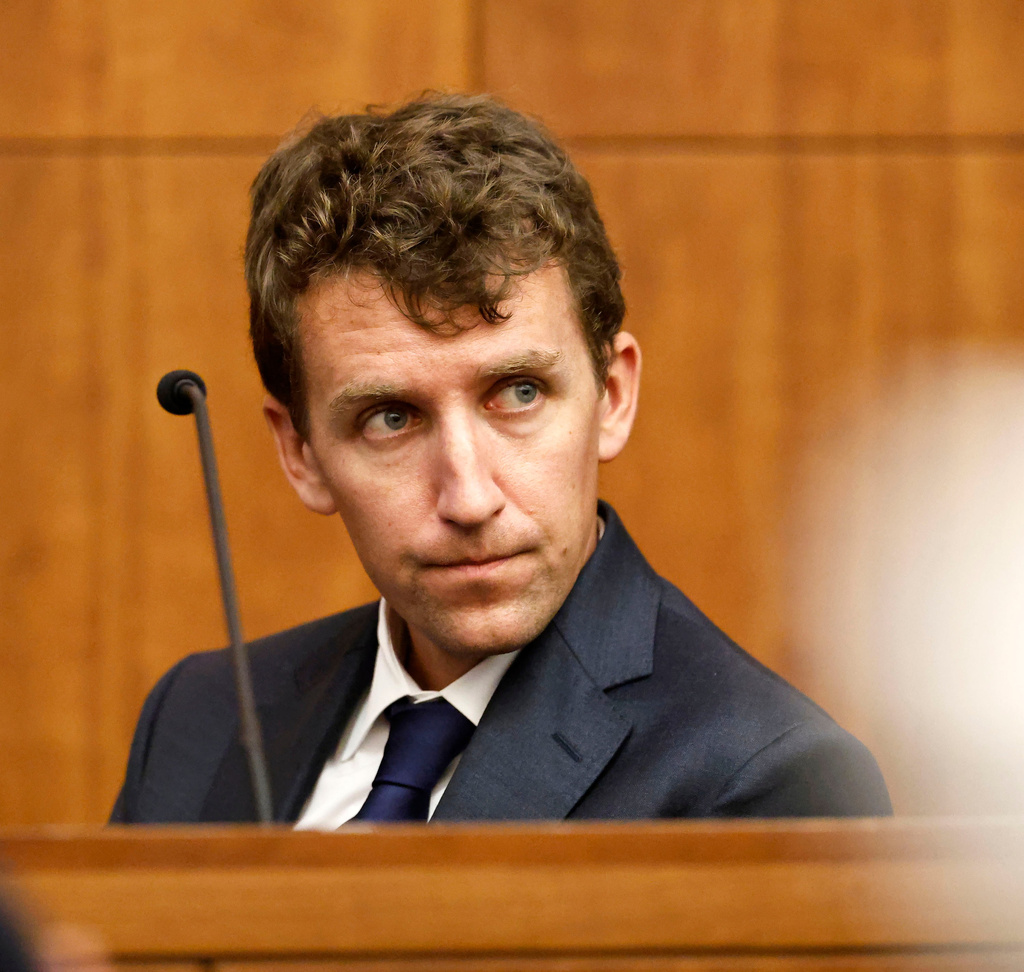 Patrick Clancy glances over at the defense table and his ex wife Lindsay Clancy is seated during her murder trial at the Plymouth Superior Court in Plymouth, Mass., Monday, July 27, 2026. (Greg Derr/The Patriot Ledger via AP, Pool)