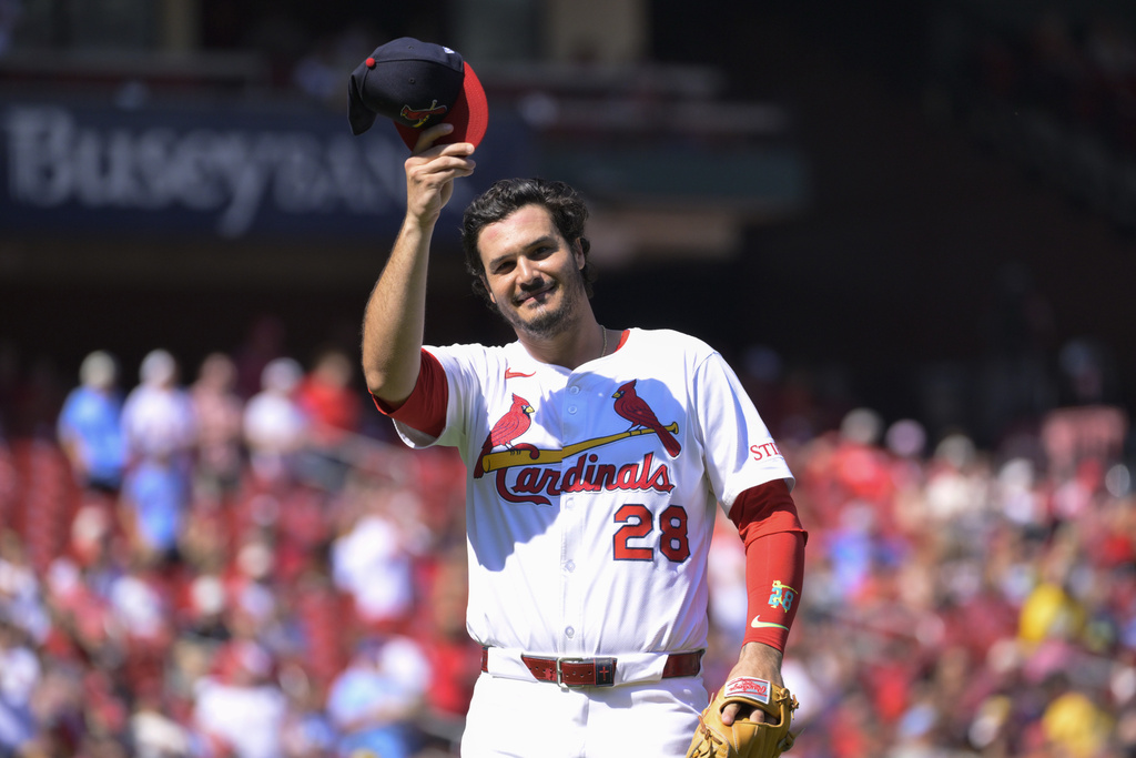 St. Louis Cardinals third baseman Nolan Arenado (28) salutes the crowd as he leaves the field during the first inning of a baseball game against the Milwaukee Brewers Sunday, Sept. 21, 2025, in St. Louis. (AP Photo/Jeff Le)