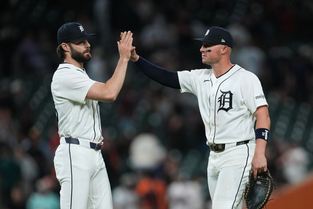 Detroit Tigers pitcher Brenan Hanifee, left, and Spencer Torkelson, right, celebrate after the final out against the Los Angeles Angels during the ninth inning of a baseball game Wednesday, May 27, 2026, in Detroit. (AP Photo/Paul Sancya)