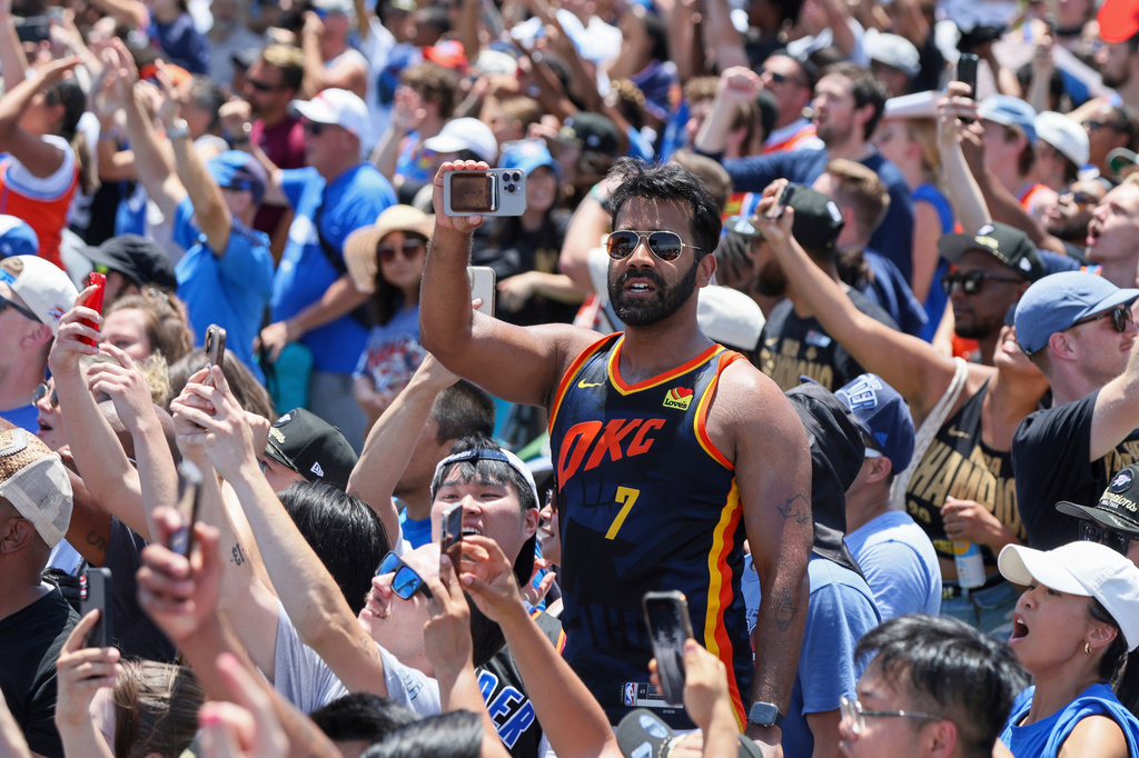 FILE - Oklahoma City Thunder fans attend a celebration of the Thunder's NBA basketball championship Tuesday, June 24, 2025, in Oklahoma City. (AP Photo/Nate Billings, File)