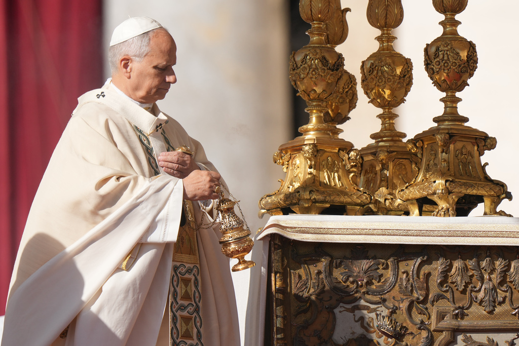 Pope Leo XIV, presides over a Mass in St. Peter's Square at the Vatican, during which he will canonize seven new saints of the Catholic Church, Sunday, Oct. 19, 2025. (AP Photo/Andrew Medichini)