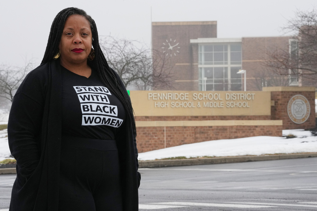Adrienne King poses for a portrait in front of Pennridge School District's buildings in Perkasie, Pa., Friday, Feb. 20, 2026. (AP Photo/Matt Rourke)