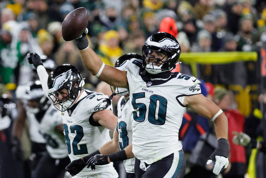 Philadelphia Eagles linebacker Jaelan Phillips (50) celebrates a fumble recovery against the Green Bay Packers during the first half of an NFL football game Monday, Nov. 10, 2025, in Green Bay, Wis. (AP Photo/Mike Roemer)