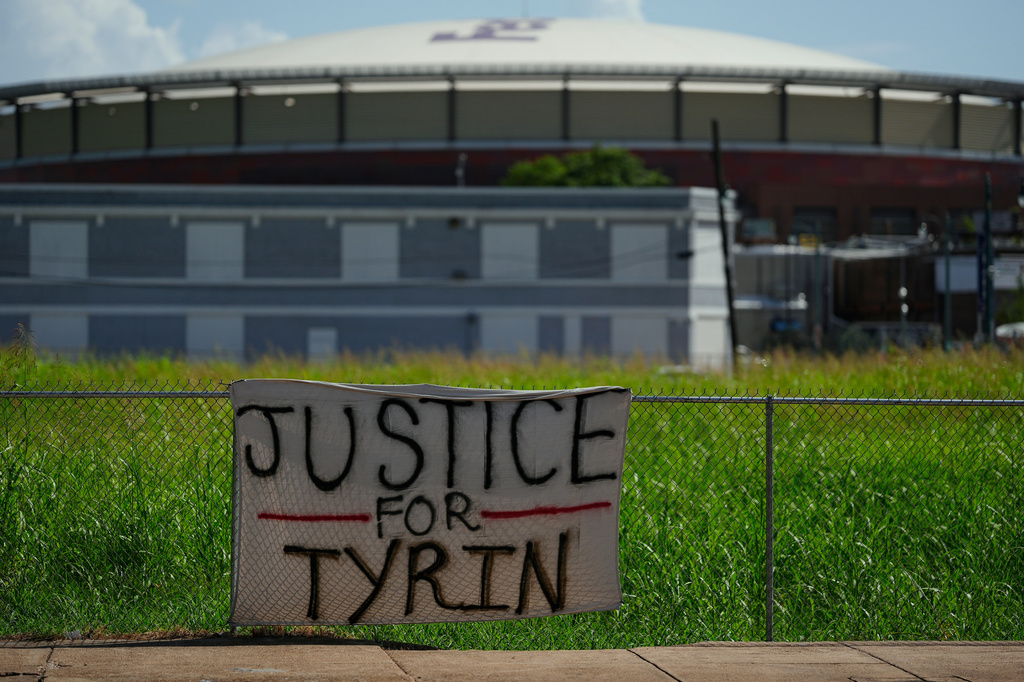 FILE - A banner for shooting victim Tyrin Johnson is seen near the corner of Union Ave. and Fourth Street, Friday, July 17, 2026, in Memphis, Tenn. (AP Photo/George Walker IV,File)