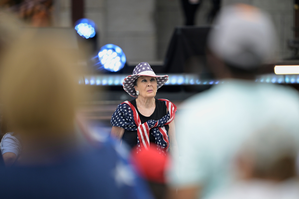 A guest attends the Rededicate 250: A National Jubilee Of Prayer, Praise & Thanksgiving, Sunday, May 17, 2026, in Washington. (AP Photo/Rod Lamkey, Jr.)
