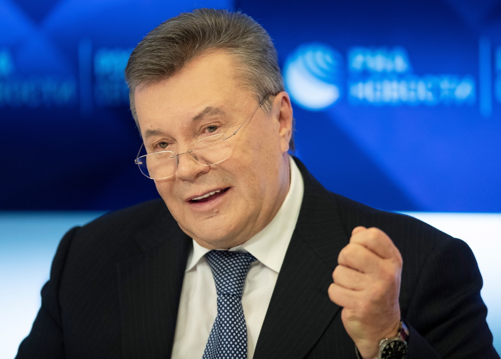 FILE - Former Ukraine President Viktor Yanukovych speaks during a news conference in Moscow, Russia, Feb. 6, 2019. (AP Photo/Pavel Golovkin, File)