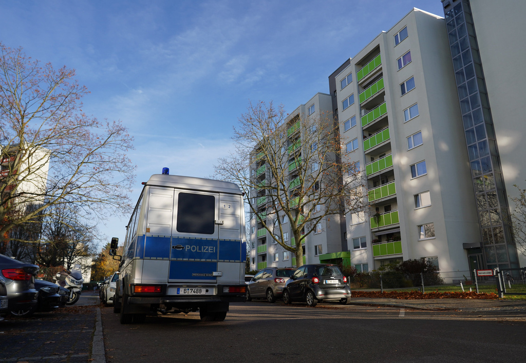 Police forces inspect a property in Berlin's Gropiusstadt district in the early morning, in Berlin, Germany, Wednesday Nov. 5, 2025, as the Federal Interior Minister Dobrindt has banned the Islamist association Muslim Interaktiv. (Manuel Genolet/dpa via AP)