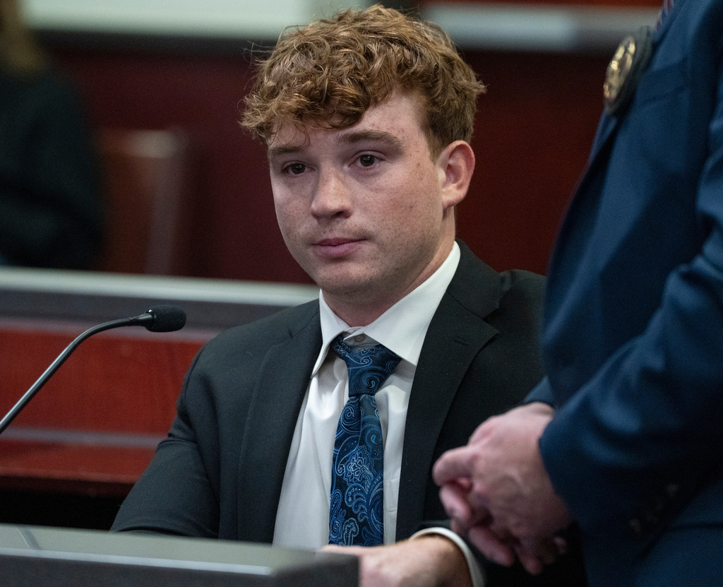 Carter Eslick is fingerprinted during his sentencing hearing in Coconino County Superior Court in Flagstaff, Ariz., on Wednesday, Sept. 30, 2026. (Mark Henle/The Arizona Republic via AP, Pool)