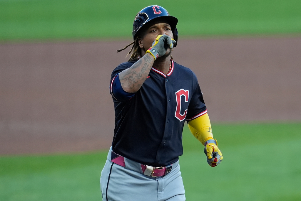 Cleveland Guardians' José Ramírez (11) celebrates his solo homerun in the first inning of a baseball game against the Atlanta Braves, Saturday, April 11, 2026, in Atlanta. (AP Photo/Mike Stewart)