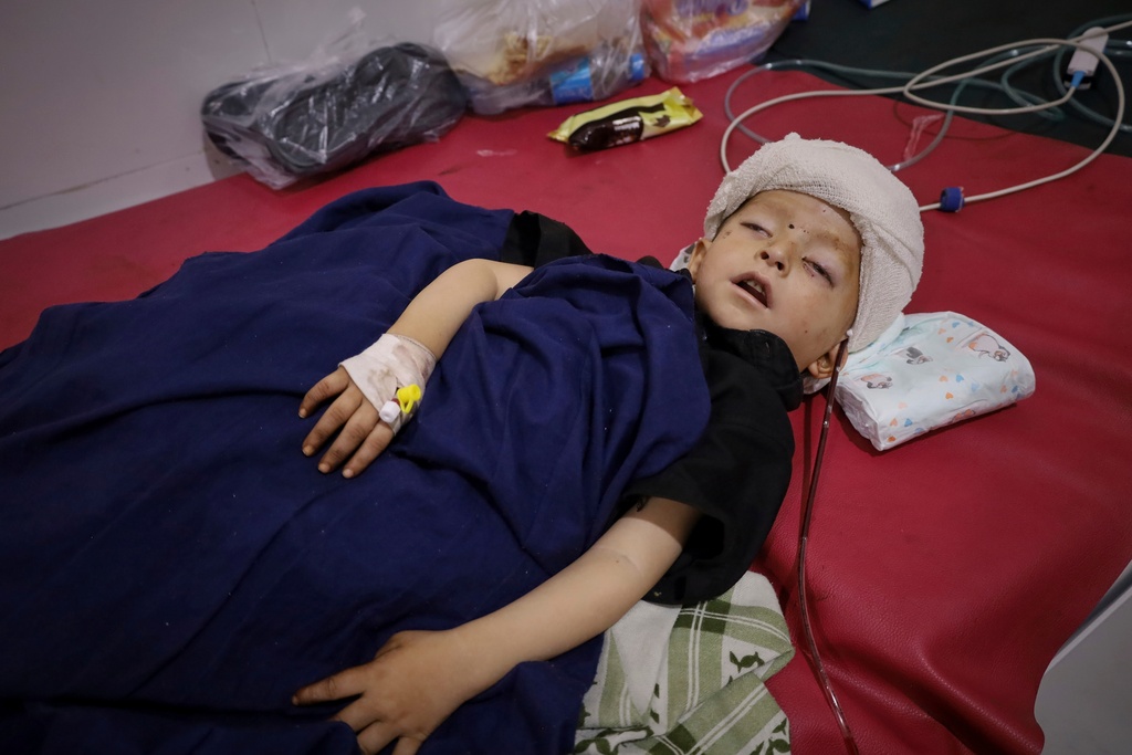 FILE - A boy injured during Sunday's powerful 6.0-magnitude earthquake that struck eastern Afghanistan lies in a hospital bed in Jalalabad, Afghanistan, Tuesday, Sept. 2, 2025. (AP Photo, File)
