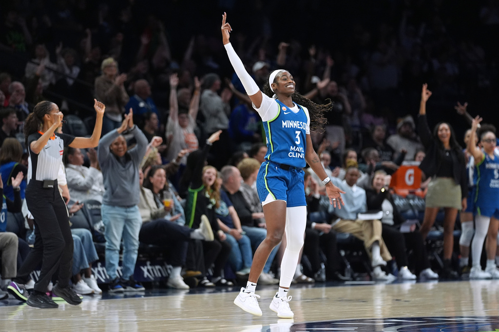 Minnesota Lynx guard Maya Caldwell (3) celebrates after making a 3-point shot during the second half of a WNBA basketball game against the Toronto Tempo Thursday, May 21, 2026, in Minneapolis. (AP Photo/Abbie Parr)