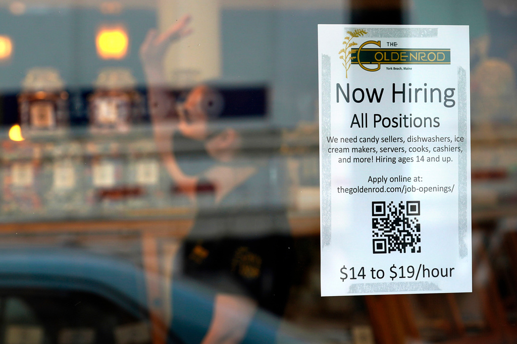 FILE - A sign advertises for help The Goldenrod, a popular restaurant and candy shop, Wednesday, June 1, 2022, in York Beach, Maine. (AP Photo/Robert F. Bukaty, File)
