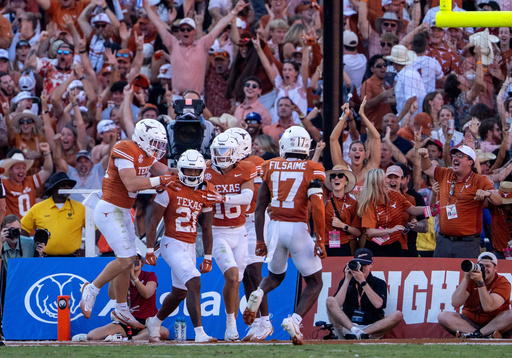 Texas punt returner Ryan Niblett (21) celebrates with teammates after returning a punt for a touchdown during the second half of an NCAA college football game against Oklahoma, Saturday, Oct. 11, 2025, in Dallas. (AP Photo/Jeffrey McWhorter) Texas punt returner Ryan Niblett (21) celebrates with teammates after returning a punt for a touchdown during the second half of an NCAA college football game against Oklahoma, Saturday, Oct. 11, 2025, in Dallas. (AP Photo/Jeffrey McWhorter)