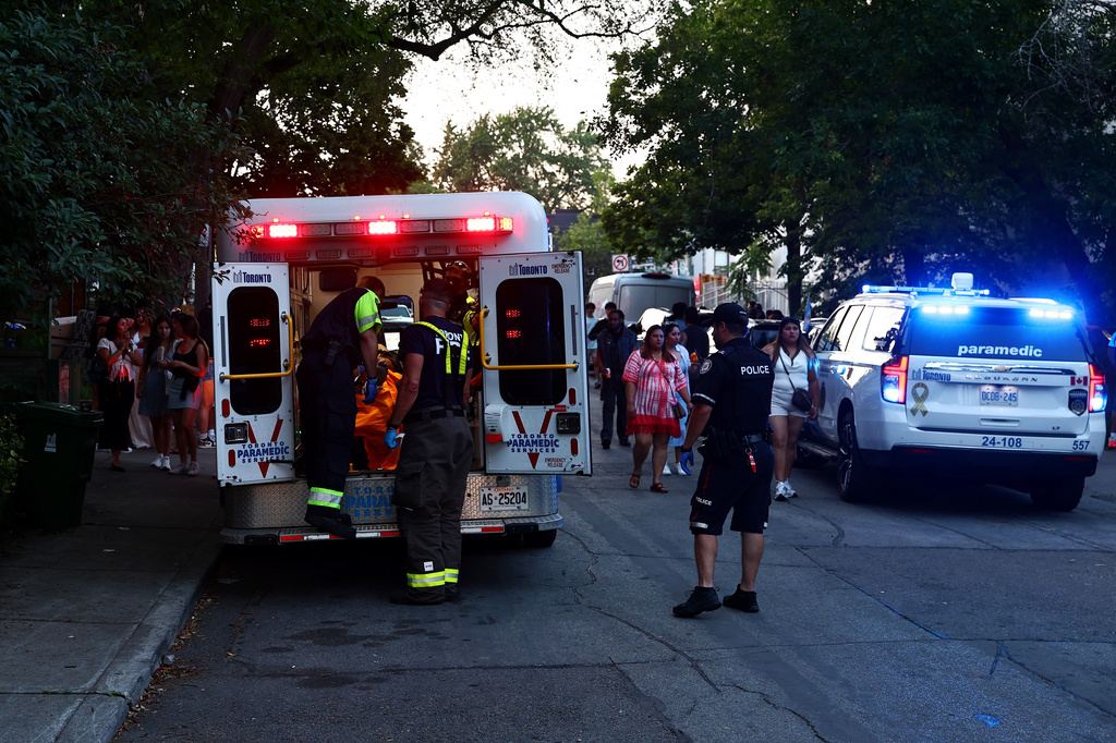 Paramedics respond to an active shooter at the Salsa on St. Clair event in Toronto, Saturday, July 11, 2026. (Keito Newman/The Canadian Press via AP)