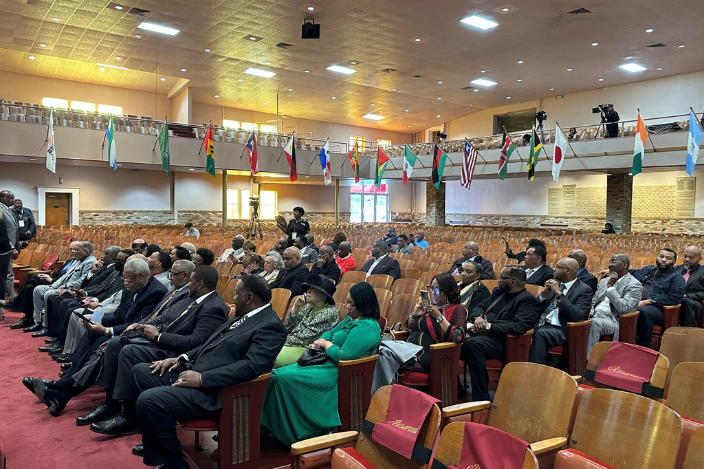 Members of the Church of God in Christ listen to speakers at a news conference announce that a federal grant for improvements has been awarded to the historic Mason Temple, Monday, April 13, 2026, in Memphis, Tenn. (AP Photo/Adrian Sainz)